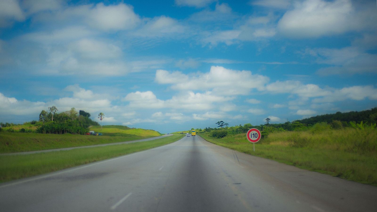Northern motorway out of Abidjan with 110 km/h sign, Cote d'Ivoire