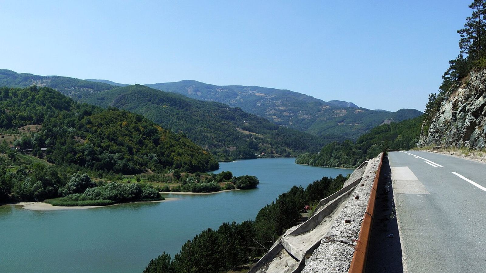 Road above Potpeć Lake between Prijepolje and Priboj, Lim valley, Serbia (stitched panorama)