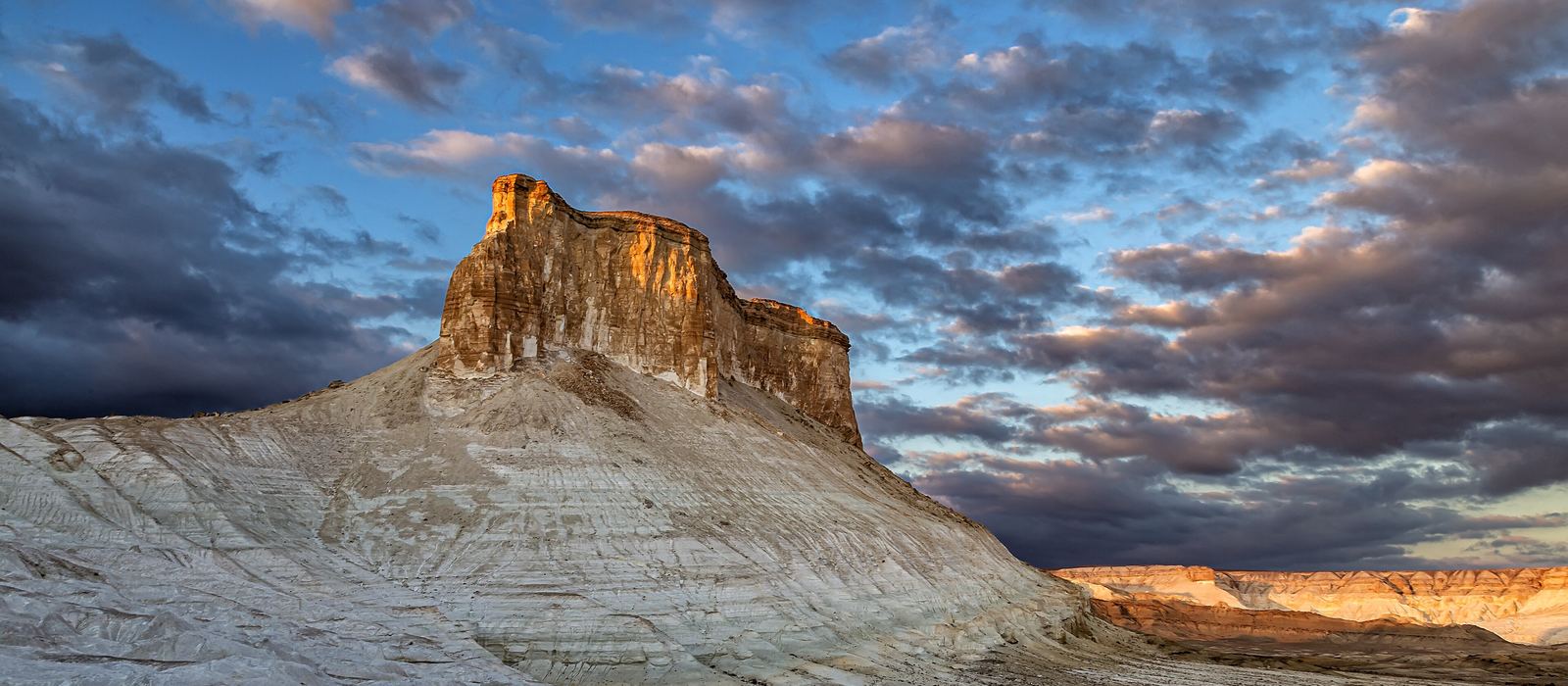 Limestone cliffs and desert of the Bozjyra gorge in Mangystau