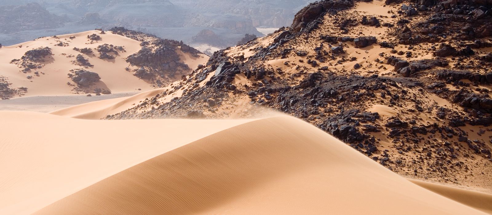 Dunes and rocky massifs in the Tadrart Acacus